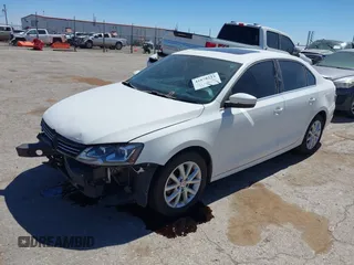 2013 Volkswagen Jetta SE z VIN 3VWDX7AJ4DM424276, wystawiony jako IAAI lot #41878223 z przebiegiem 152 789 mil mil oraz . Historia ofert i sprzedaży dostępna na DreamBid. Obrazek 2.