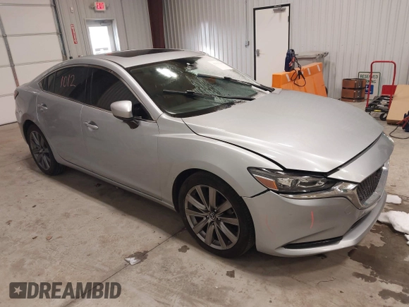 2018 Mazda 6 Touring with VIN JM1GL1VM8J1312778, listed as a IAAI auction lot 41387098 with 129,611 mi miles and . Bid and sale history available at carsss.com. Image 1.