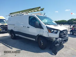 2020 Ford Transit Cargo z VIN 1FTBR1Y86LKB30999, wystawiony jako IAAI lot #42290268 z przebiegiem 88 678 mil mil oraz . Historia ofert i sprzedaży dostępna na DreamBid. Obrazek 1.