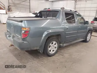 2006 Honda Ridgeline RTL with VIN 2HJYK16556H508101, listed as a IAAI auction lot 41909651 with 301,945 mi miles. Bid and sale history available at carsss.com. Image 4.