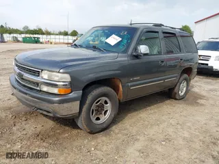 2002 Chevrolet Tahoe LT with VIN 1GNEK13Z42J203185, listed as a IAAI auction lot 41940552 with 325,618 mi miles. Bid and sale history available at carsss.com. Image 2.