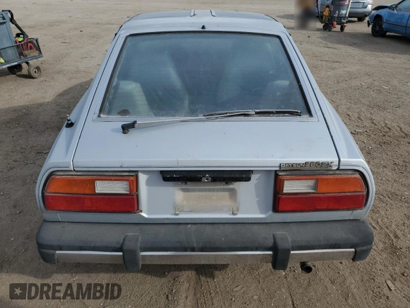 1981 Datsun 280ZX z VIN JN1HZ04S2BX413331, wystawiony jako Copart lot #50431235 z przebiegiem 98 237 mil mil oraz Tytuł czysty. Historia ofert i sprzedaży dostępna na DreamBid. Obrazek 10.
