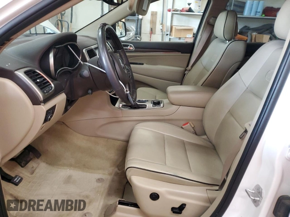2017 Jeep Grand Cherokee Overland z VIN 1C4RJFCG8HC809868, wystawiony jako Copart lot #64056155 z przebiegiem 54 136 mil mil oraz Szkoda całkowita • Salvage title. Historia ofert i sprzedaży dostępna na DreamBid. Obrazek 7.