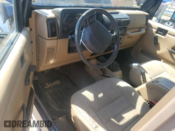 2002 Jeep Wrangler X with VIN 1J4FA39S32P735671, listed as a Copart auction lot 68236084 with 137,587 mi miles and Salvage Title. Bid and sale history available at carsss.com. Image 8.