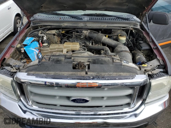 2002 Ford F-250 XL with VIN 1FTNF21L42EC09918, listed as a Copart auction lot 47365425 with 169,115 mi miles and Salvage title. Bid and sale history available at DreamBid. Image 11.