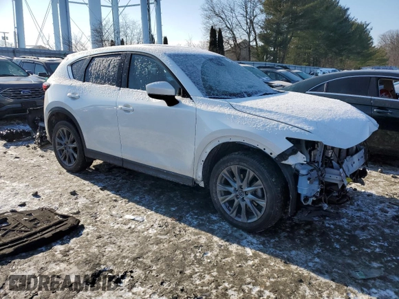 2021 Mazda CX-5 Signature with VIN JM3KFBEY5M0447759, listed as a Copart auction lot 42565535 with 24,175 mi miles and Salvage Title. Bid and sale history available at carsss.com. Image 4.