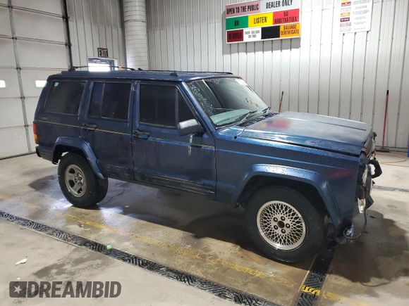 1995 Jeep Cherokee z VIN 1J4FN78S7SL537213, wystawiony jako Copart lot #58700105 z przebiegiem 261 606 mil mil oraz Szkoda całkowita • Salvage title. Historia ofert i sprzedaży dostępna na DreamBid. Obrazek 4.