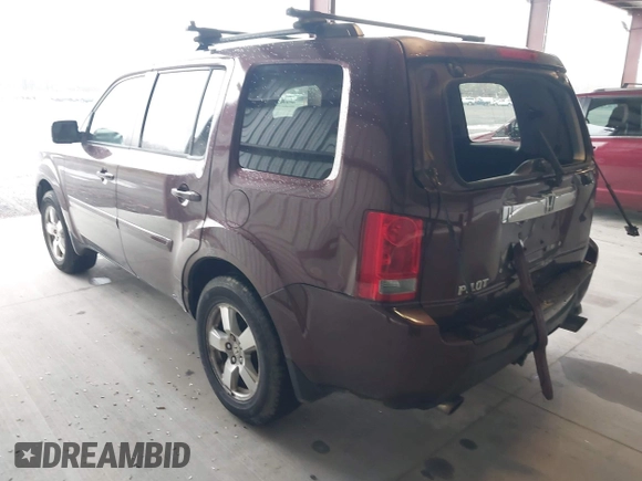2009 Honda Pilot EX with VIN 5FNYF48499B005597, listed as a IAAI auction lot 41975121 with 309,769 mi miles. Bid and sale history available at carsss.com. Image 3.