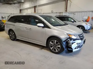 2014 Honda Odyssey Touring with VIN 5FNRL5H97EB005977, listed as a Copart auction lot 53849025 with 229,915 mi miles and Non Repairable. Bid and sale history available at DreamBid. Image 4.