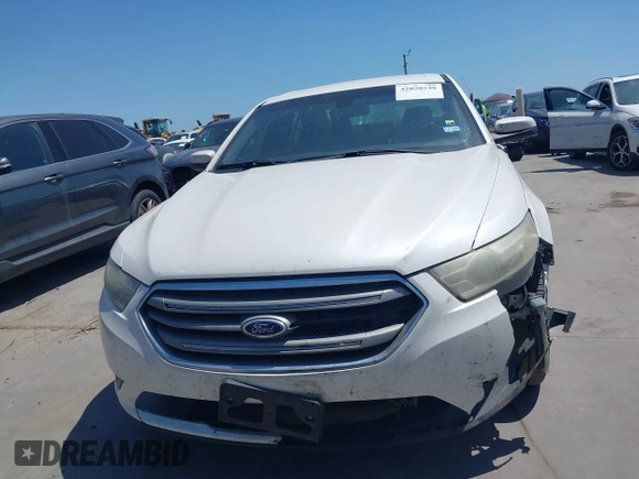 2013 Ford Taurus SEL with VIN 1FAHP2E83DG212029, listed as a IAAI auction lot 42020548 with 172,887 mi miles. Bid and sale history available at carsss.com. Image 12.