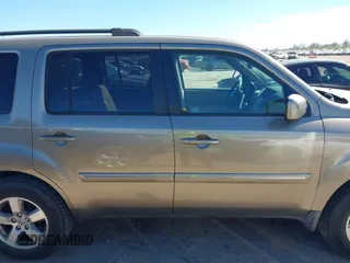 2010 Honda Pilot EX-L z VIN 5FNYF4H56AB001911, wystawiony jako IAAI lot #41806101 z przebiegiem 188 949 mil mil oraz . Historia ofert i sprzedaży dostępna na DreamBid. Obrazek 13.