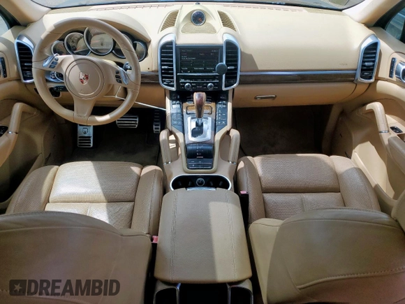 2013 Porsche Cayenne S Hybrid с VIN WP1AE2A20DLA14095, выставлен на аукционе Copart как лот 64215625 с пробегом 148 286 миль миль и Списание • Salvage title. История ставок и продаж доступна на DreamBid. Изображение 8.