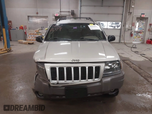 2004 Jeep Grand Cherokee Laredo with VIN 1J4GW48S44C321869, listed as a IAAI auction lot 41822099 with 181,663 mi miles. Bid and sale history available at carsss.com. Image 12.