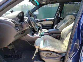 2005 BMW X5 4.8is with VIN 5UXFA93565LE83388, listed as a Copart auction lot 52412585 with 162,200 mi miles and Salvage Title. Bid and sale history available at carsss.com. Image 7.
