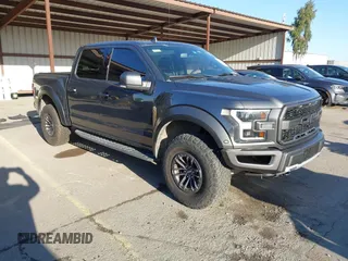 2020 Ford F-150 Raptor with VIN 1FTFW1RG5LFA62445, listed as a IAAI auction lot 41811982 with 95,947 mi miles and . Bid and sale history available at carsss.com. Image 1.