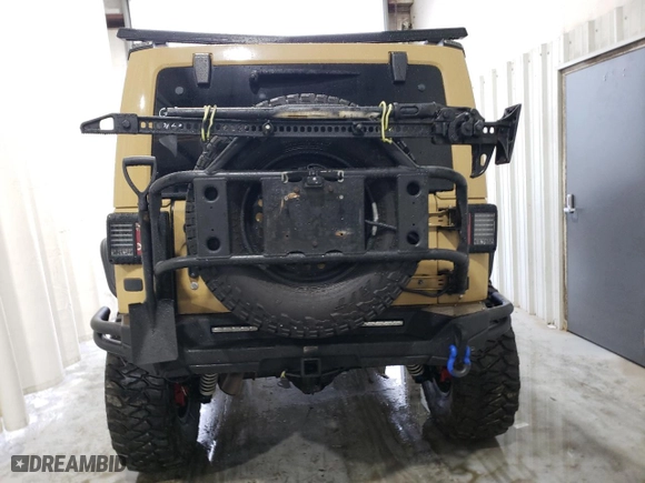 2012 Jeep Wrangler Unlimited Sahara with VIN 1C4BJWEG5CL281584, listed as a Copart auction lot 50982655 with 132,548 mi miles and Salvage Title. Bid and sale history available at carsss.com. Image 6.