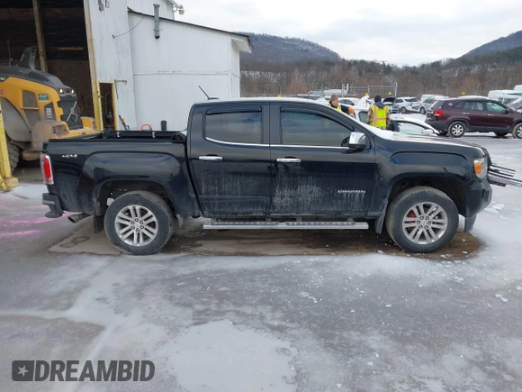 2015 GMC Canyon 4WD SLT with VIN 1GTG6CE39F1202730, listed as a IAAI auction lot 41510275 with 114,444 mi miles. Bid and sale history available at carsss.com. Image 14.