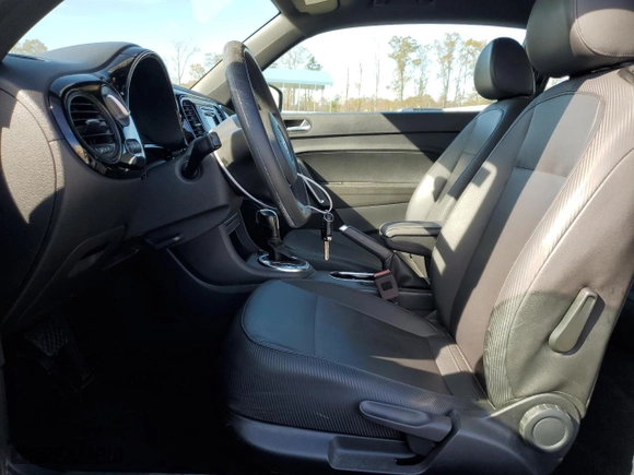2017 Volkswagen Beetle 1.8T S with VIN 3VWF17AT3HM633252, listed as a Copart auction lot 81899254 with 144,566 mi miles and Salvage Title. Bid and sale history available at carsss.com. Image 7.