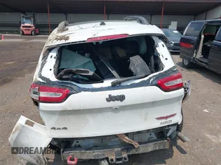 2017 Jeep Cherokee Trailhawk with VIN 1C4PJMBSXHW657446, listed as a IAAI auction lot 42406437 with 158,351 mi miles and . Bid and sale history available at DreamBid. Image 17.