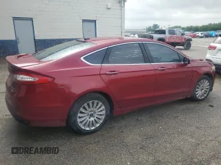 2016 Ford Fusion Titanium z VIN 3FA6P0K98GR360666, wystawiony jako Copart lot #63940635 z przebiegiem 202 120 mil mil oraz Czysty tytuł • Clean title. Historia ofert i sprzedaży dostępna na DreamBid. Obrazek 3.