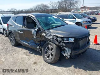 2014 Hyundai Santa Fe Sport with VIN 5XYZU3LB9EG223746, listed as a IAAI auction lot 41717037 with 108,820 mi miles. Bid and sale history available at carsss.com. Image 1.