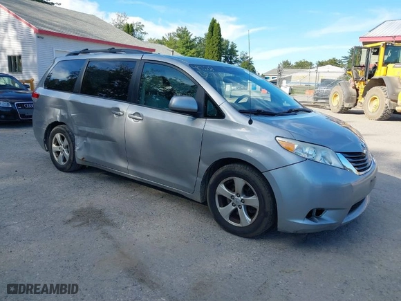 2014 Toyota Sienna LE AAS with VIN 5TDKK3DC3ES428027, listed as a IAAI auction lot 40285877 with 165,510 mi miles. Bid and sale history available at carsss.com. Image 1.