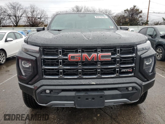2023 GMC Canyon 4WD AT4 with VIN 1GTP6DEK6P1139567, listed as a Copart auction lot 85416794 with 26,583 mi miles and Salvage Title. Bid and sale history available at carsss.com. Image 5.
