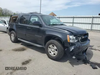 2012 Chevrolet Suburban LT with VIN 1GNSKJE77CR298049, listed as a Copart auction lot 61171865 with 247,737 mi miles and Salvage title. Bid and sale history available at DreamBid. Image 4.