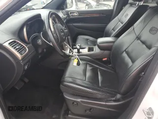 2015 Jeep Grand Cherokee Overland with VIN 1C4RJECG7FC872175, listed as a Copart auction lot 50653205 with 117,433 mi miles and Salvage title. Bid and sale history available at DreamBid. Image 7.