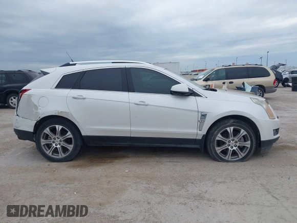 2012 Cadillac SRX Premium Collection with VIN 3GYFNCE32CS579256, listed as a IAAI auction lot 42660666 with 125,236 mi miles and . Bid and sale history available at DreamBid. Image 13.