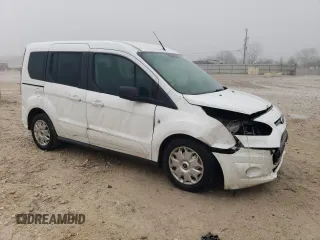 2014 Ford Transit Connect XLT with VIN NM0AE8F76E1149794, listed as a Copart auction lot 43130385 with 210,682 mi miles and Salvage title. Bid and sale history available at DreamBid. Image 4.