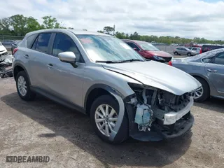 2014 Mazda CX-5 Touring with VIN JM3KE2CY4E0357445, listed as a IAAI auction lot 41967334 with 115,535 mi miles. Bid and sale history available at carsss.com. Image 1.