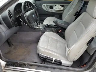 1998 BMW 3 Series 323i with VIN WBABJ8332WEM22760, listed as a Copart auction lot 59631805 with 77,300 mi miles and Salvage title. Bid and sale history available at DreamBid. Image 7.