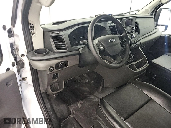 2023 Ford Transit Cargo with VIN 1FTBW3U84PKB20116, listed as a IAAI auction lot 42748031 with 6,591 mi miles and . Bid and sale history available at DreamBid. Image 13.