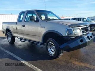 1997 Ford F-150 XL with VIN 1FTDX18W7VKB72498, listed as a IAAI auction lot 41390245 with 55,945 mi miles. Bid and sale history available at carsss.com. Image 1.