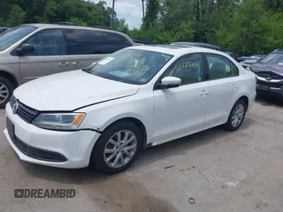 2011 Volkswagen Jetta SE with VIN 3VWDX7AJXBM348012, listed as a IAAI auction lot 42725404 with 235,361 mi miles and . Bid and sale history available at DreamBid. Image 2.
