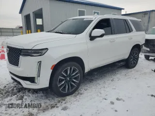 2021 Cadillac Escalade Premium Luxury z VIN 1GYS4BKL4MR414197, wystawiony jako Copart lot #88093605 z przebiegiem 63 196 mil mil oraz Szkody całkowita. Historia ofert i sprzedaży dostępna na DreamBid. Obrazek 1.