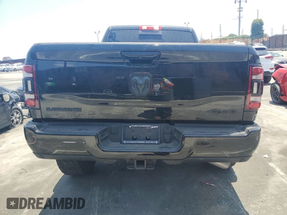 2023 Ram 2500 Laramie with VIN 3C6UR5FL9PG519650, listed as a Copart auction lot 61636815 with 39,335 mi miles and Salvage title. Bid and sale history available at DreamBid. Image 6.