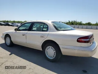 1995 Lincoln Continental z VIN 1LNLM97V3SY641554, wystawiony jako Copart lot #55001165 z przebiegiem 173 490 mil mil oraz Szkody całkowita. Historia ofert i sprzedaży dostępna na DreamBid. Obrazek 2.