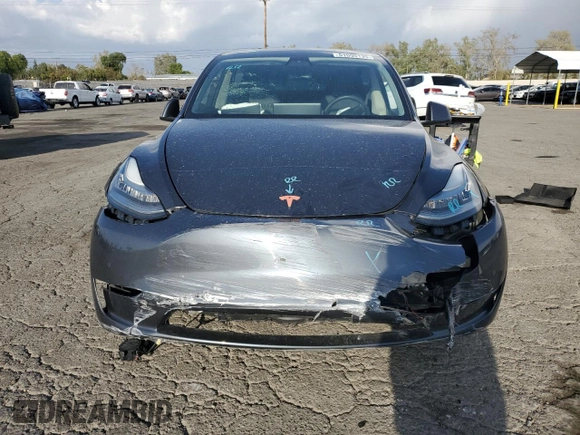 2021 Tesla Model Y Standard Range with VIN 5YJYGDED7MF109418, listed as a Copart auction lot 51590135 with 86,668 mi miles and Salvage Title. Bid and sale history available at DreamBid. Image 5.