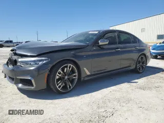 2018 BMW 5 Series M550i xDrive with VIN WBAJB9C5XJB049624, listed as a Copart auction lot 48846695 with 0 mi miles and Salvage Title. Bid and sale history available at carsss.com. Image 1.