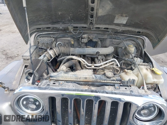 2004 Jeep Wrangler Sahara with VIN 1J4FA59S54P740417, listed as a IAAI auction lot 42382078 with 200,108 mi miles and . Bid and sale history available at DreamBid. Image 10.
