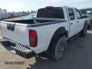 2002 Nissan Frontier SE z VIN 1N6ED27T22C382889, wystawiony jako IAAI lot #41548098 z przebiegiem Nie podano mil oraz . Historia ofert i sprzedaży dostępna na DreamBid. Obrazek 17.