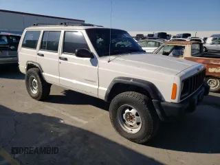2000 Jeep Cherokee SE with VIN 1J4FF28S5YL243656, listed as a Copart auction lot 71364434 with 222,032 mi miles and Salvage Title. Bid and sale history available at carsss.com. Image 4.