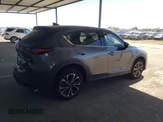 2022 Mazda CX-5 2.5 S Premium Package with VIN JM3KFBDM5N0602570, listed as a Copart auction lot 50441125 with 25,199 mi miles and Salvage Title. Bid and sale history available at carsss.com. Image 3.