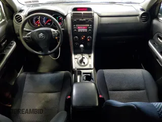 2007 Suzuki Grand Vitara z VIN JS3TD941874204462, wystawiony jako Copart lot #67671174 z przebiegiem 174 844 mil mil oraz Szkoda całkowita • Salvage title. Historia ofert i sprzedaży dostępna na DreamBid. Obrazek 8.