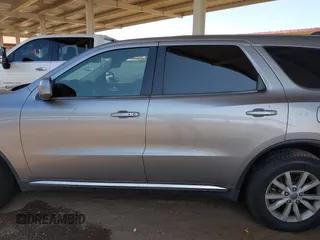 2015 Dodge Durango SXT z VIN 1C4RDJAG7FC240103, wystawiony jako IAAI lot #42621514 z przebiegiem 197 257 mil mil oraz . Historia ofert i sprzedaży dostępna na DreamBid. Obrazek 14.