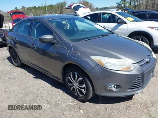 2012 Ford Focus SE with VIN 1FAHP3F2XCL433827, listed as a IAAI auction lot 41843960 with 156,343 mi miles. Bid and sale history available at carsss.com. Image 1.