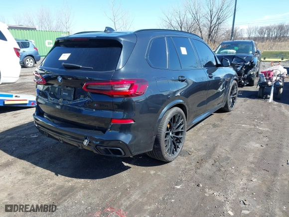 2019 BMW X5 xDrive50i with VIN 5UXJU2C5XKLN66873, listed as a IAAI auction lot 41472246 with 98,571 mi miles. Bid and sale history available at carsss.com. Image 4.