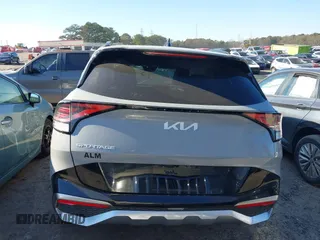2023 Kia Sportage SX-Prestige z VIN 5XYK53AF7PG133325, wystawiony jako IAAI lot #41278082 z przebiegiem 26 361 mil mil oraz . Historia ofert i sprzedaży dostępna na DreamBid. Obrazek 16.
